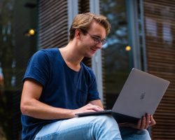 selective-focus-photo-of-man-using-laptop-1438081